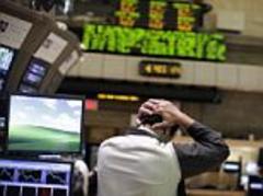 Turbulent FTSE rises as US retail sales jump