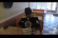 Barstool Sports Blogger Reviews Rosie's Pizza in Full Bruins Uniform